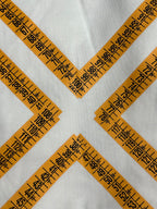 Off-White T-shirt close-up of orange ruler-measurement arrow lines forming X