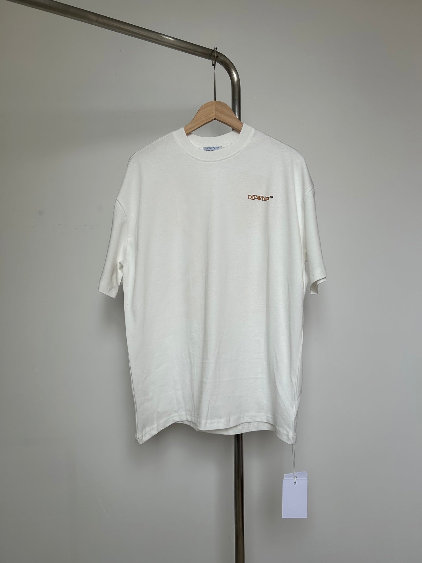 Off-White off-white T-shirt with small orange chest logo and crew neck
