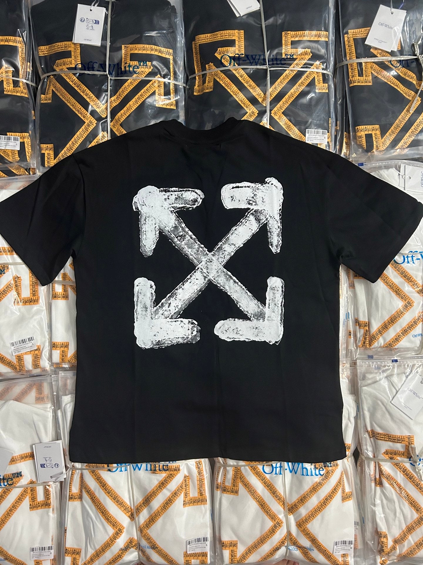 Black Off White T-shirt back with large white graffiti X arrow logo
