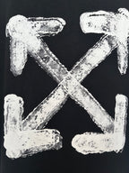 Black T-shirt close-up of off-white distressed X and arrows graphic