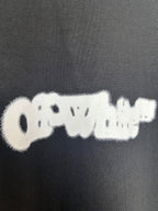 Black T-shirt fabric with off-white distressed logo detail