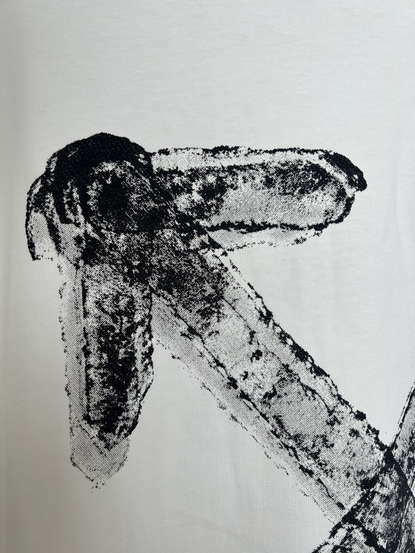 Off-white T-shirt with black printed logo letter detail on chest