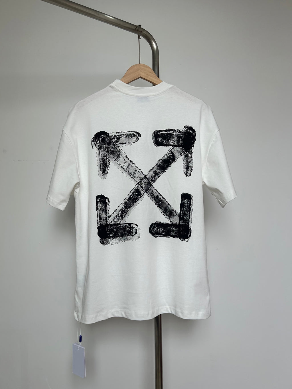 Off-white graphic T-shirt with large black X-shaped logo print