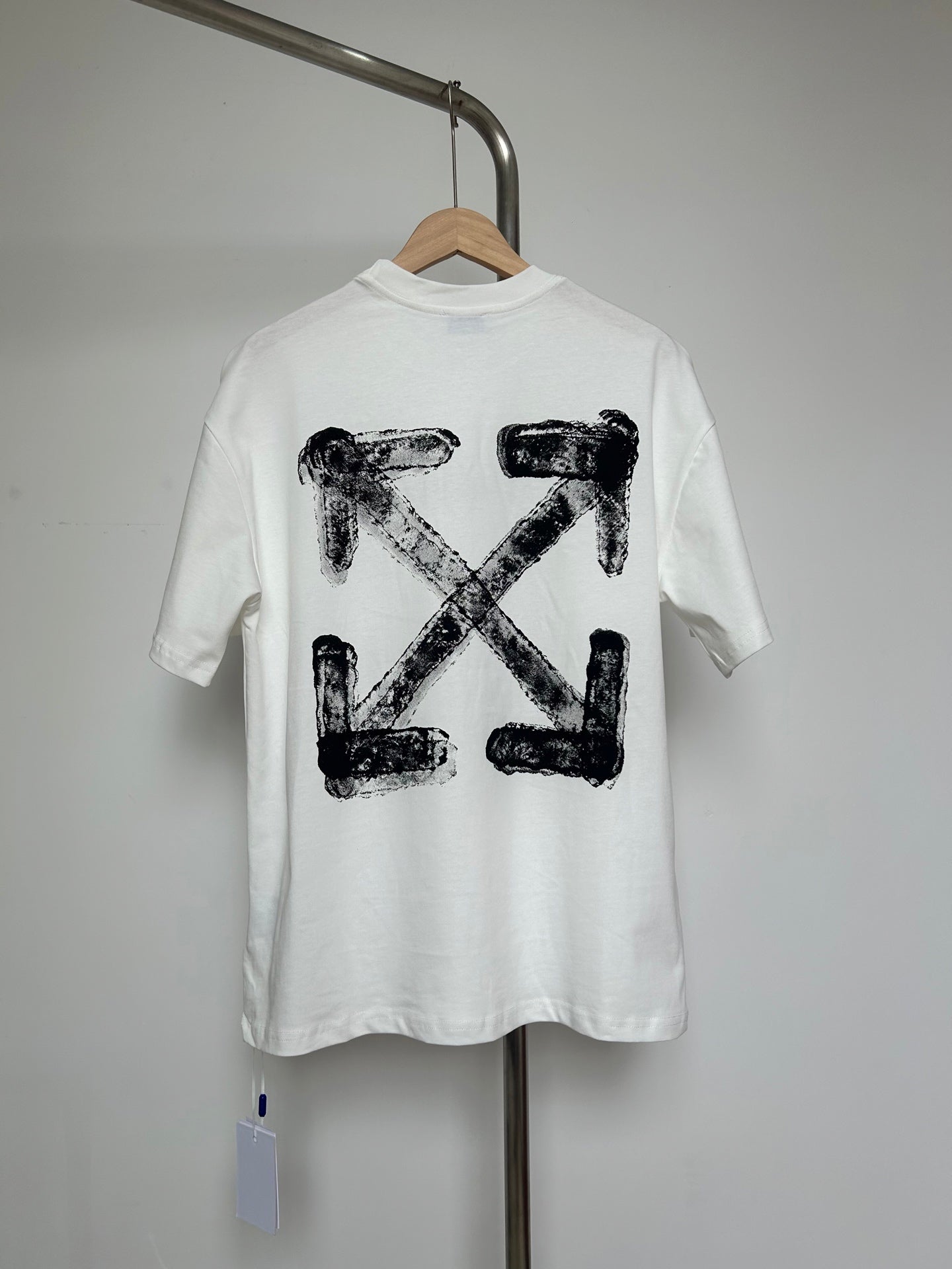 Off-white graphic T-shirt with large black X-shaped logo print