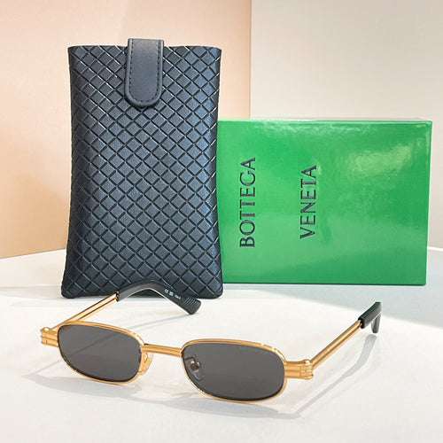 Bottega Veneta oval sunglasses, gold frame with dark brown lenses