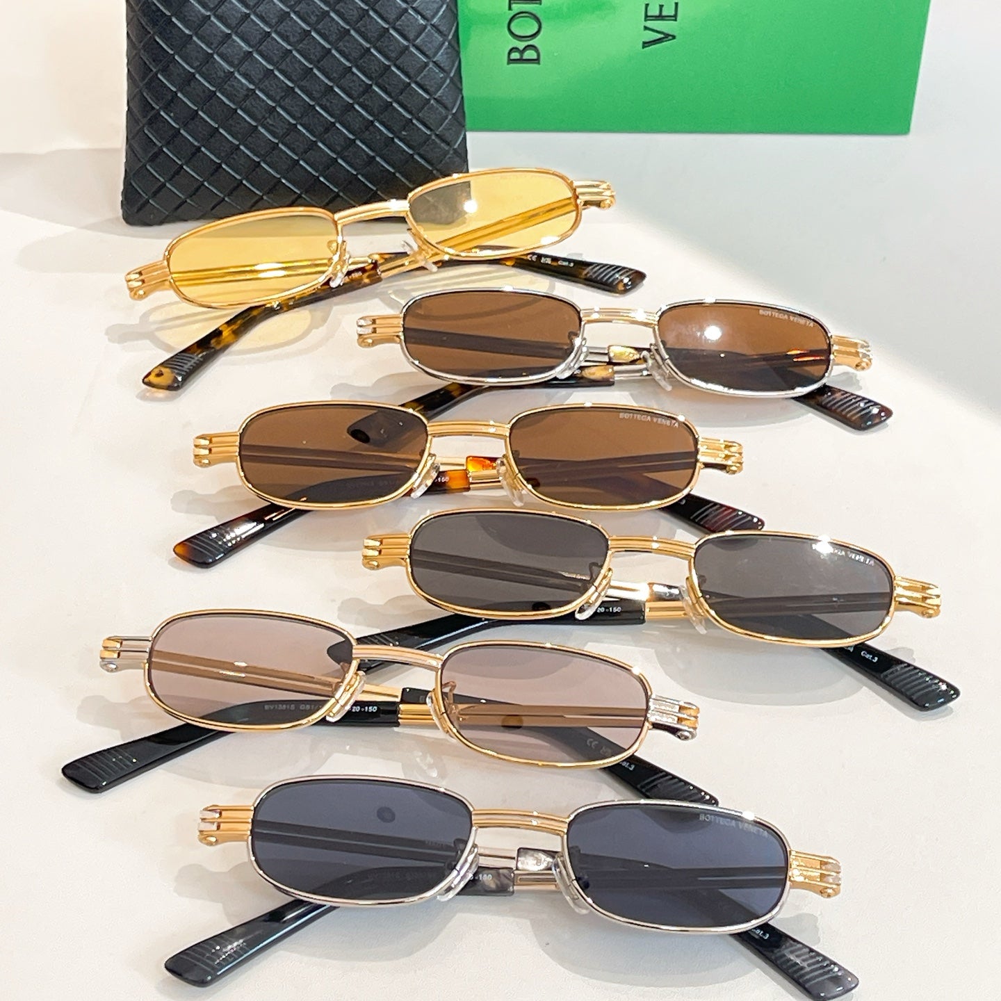 Bottega Veneta sunglasses set, gold frames with dark lenses