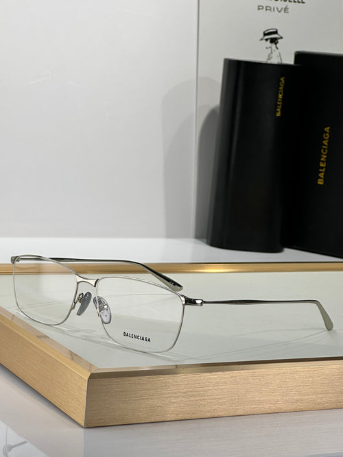 Balenciaga eyeglass frame with clear lenses and dark temple arms, side view