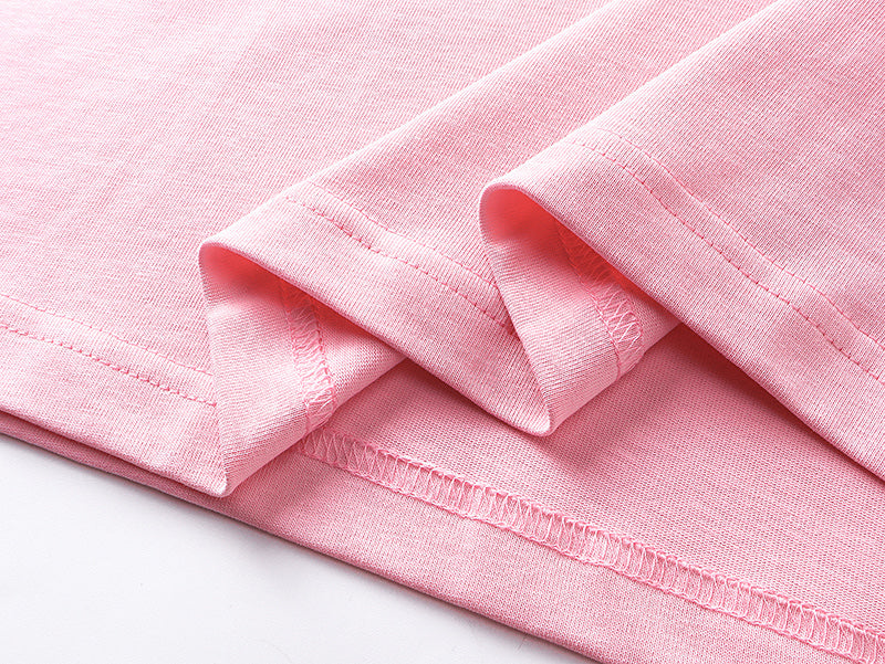 Pink T-shirt sleeve cuff and hem stitching detail