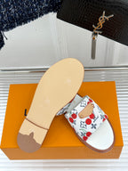 Ladies slide sandal with white cherry-pattern strap and light beige outsole
