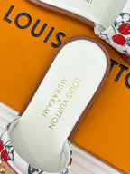 Ladies slide sandal heel with white leather footbed and Louis Vuitton marking