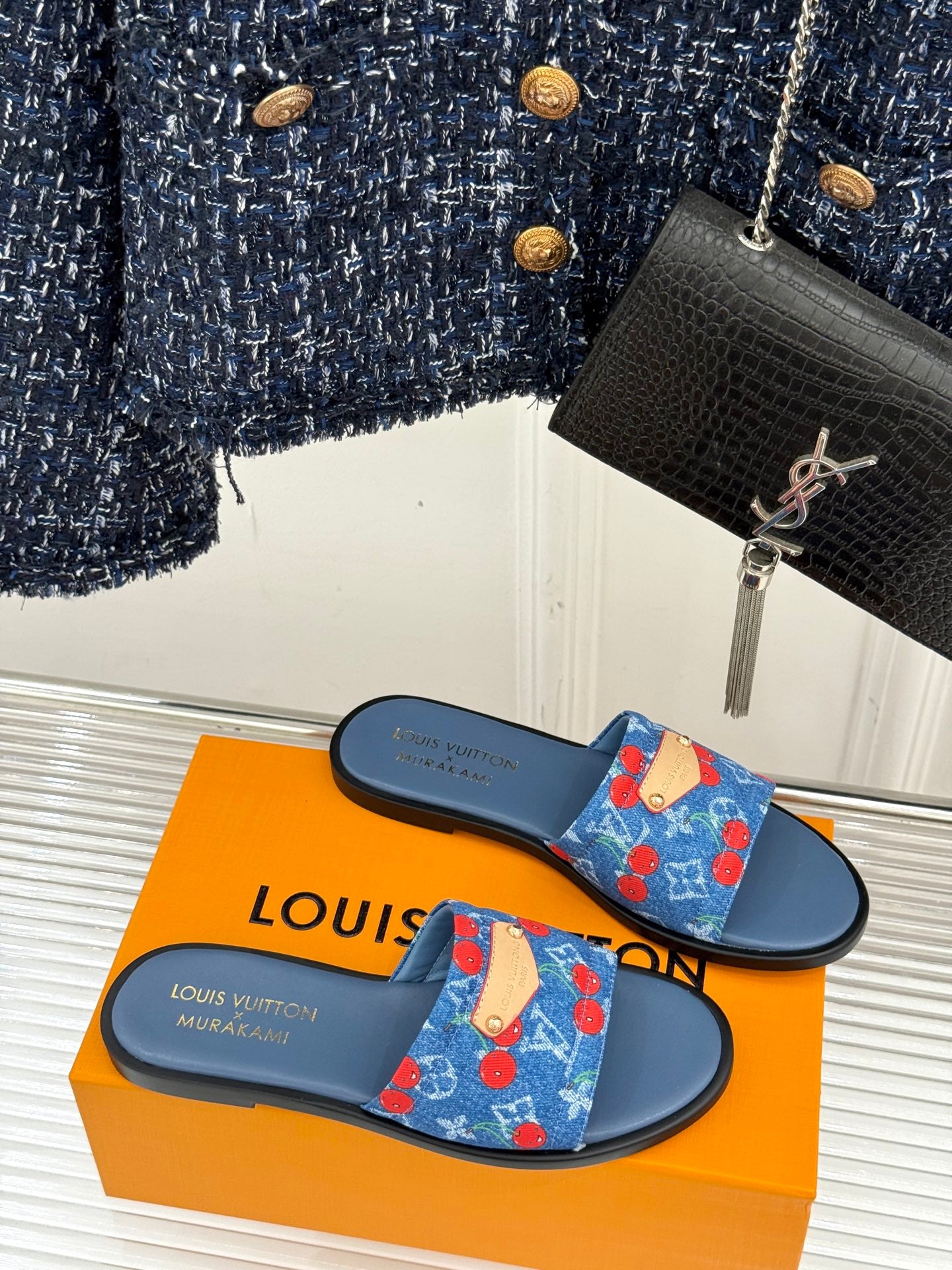Louis Vuitton cherry-print denim slide sandals with blue footbed, side view
