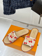 Louis Vuitton cherry-print slide sandals, beige footbed and tan sole