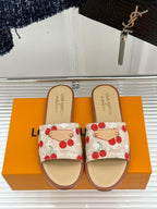 Louis Vuitton cherry-print slide sandals with gold snap strap detail and tan sole