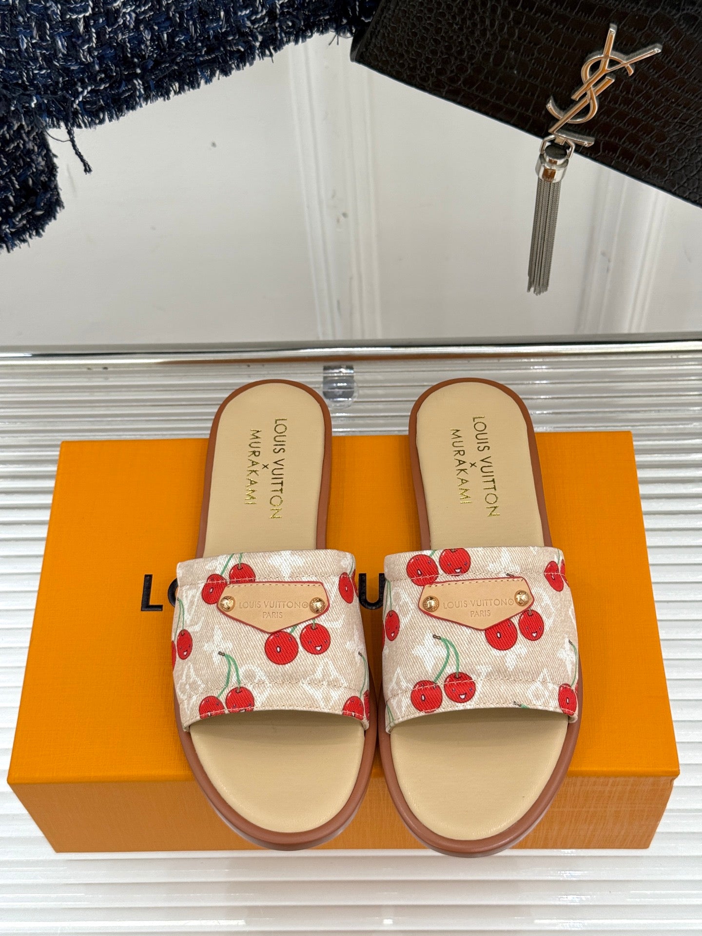 Louis Vuitton cherry-print slide sandals with gold snap strap detail and tan sole