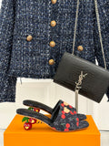 Women’s Louis Vuitton logo slide mules with cherry print and black slip-on straps