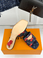 Women’s Louis Vuitton cherry print slide mules with beige outsole and black straps