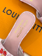 Pink Louis Vuitton sandal insole with gold lettering and scalloped trim