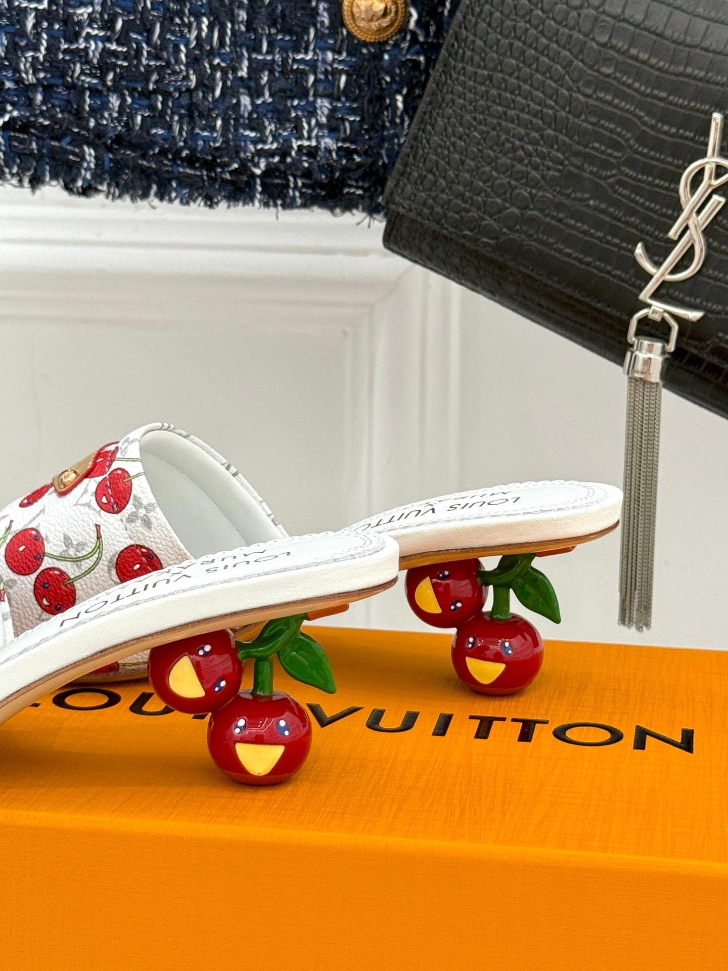 Louis Vuitton women's white flat sandals with cherry-print strap and gold hardware