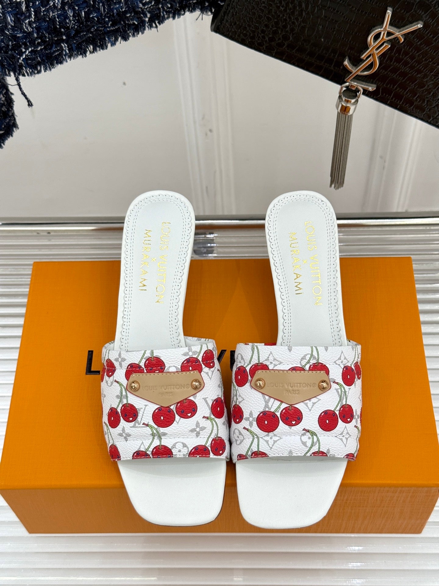 Louis Vuitton women's white cherry-print slide sandals with gold-toned buckle straps