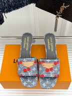 Louis Vuitton gray slide sandals pair with cherry print uppers and tan leather straps