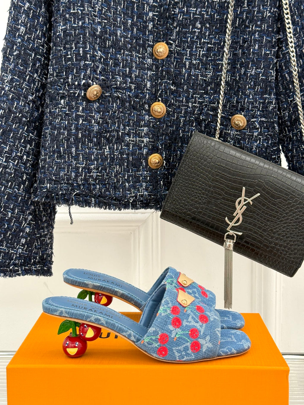 Louis Vuitton blue denim mules with red cherry pattern and gold buckle detail