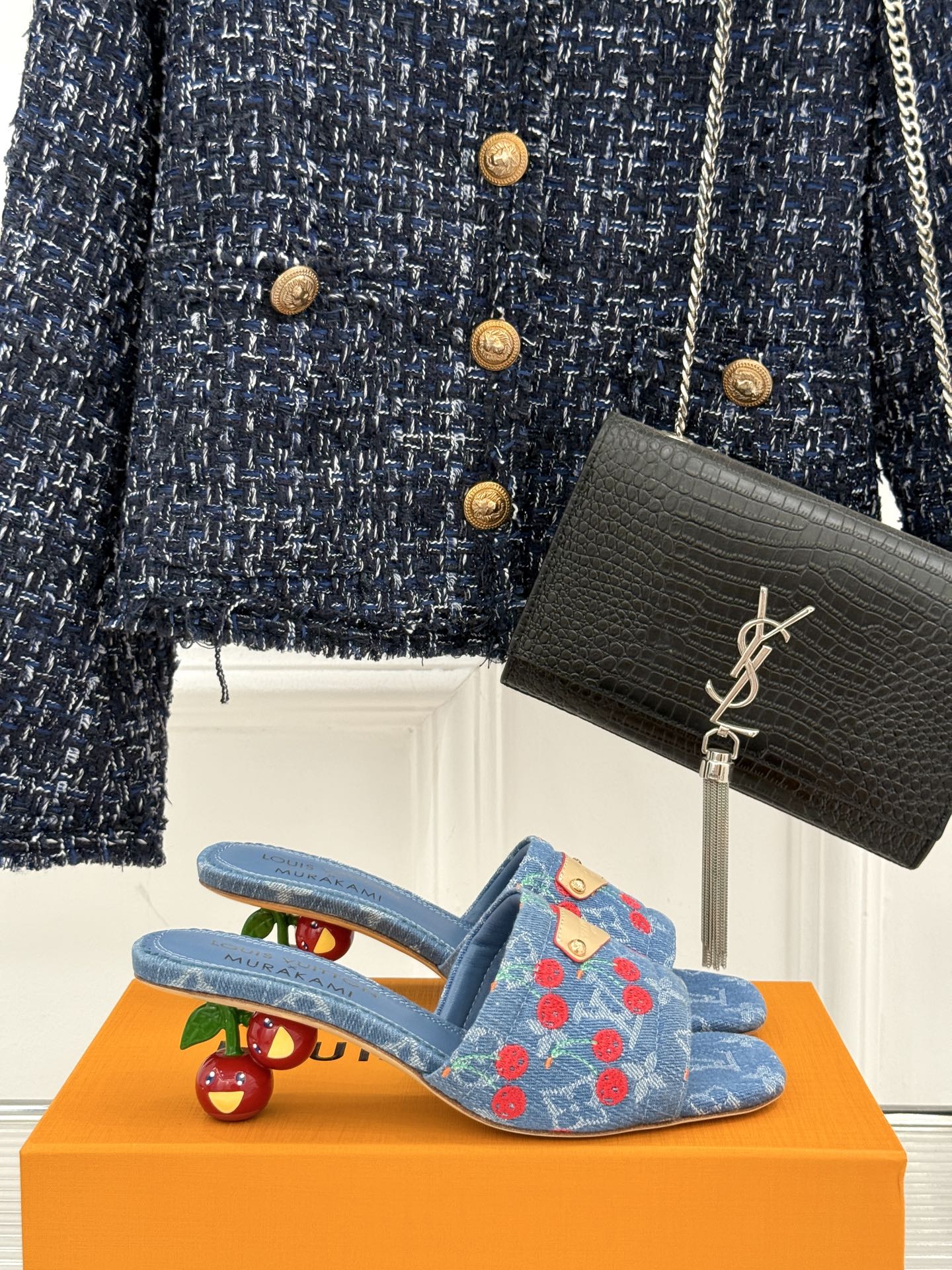 Louis Vuitton blue denim mules with red cherry pattern and gold buckle detail