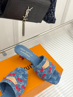 Louis Vuitton blue denim mules with red cherry print and gold buckle on open toe