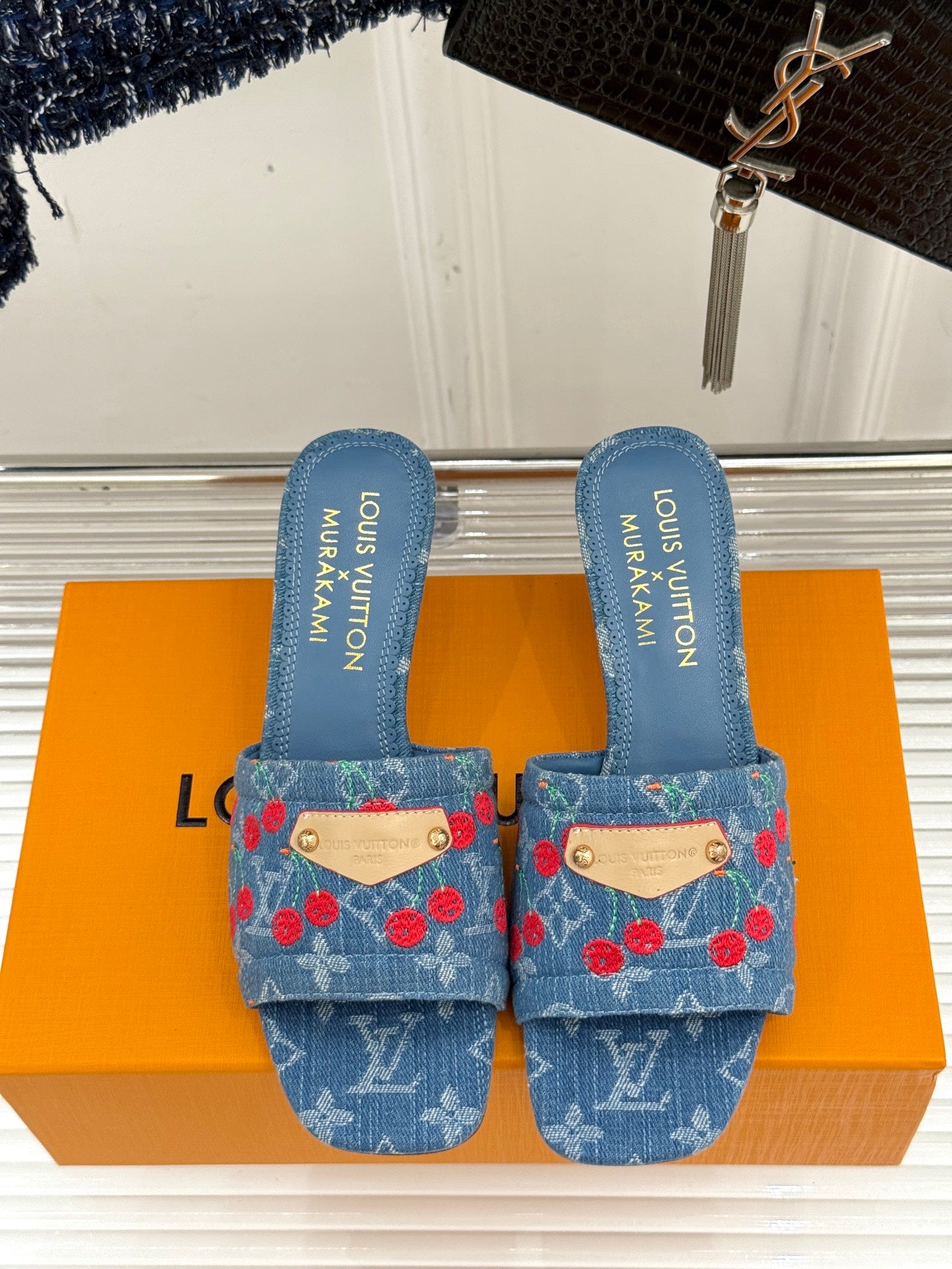 Louis Vuitton blue denim slide mules with red cherries and logo-printed lining