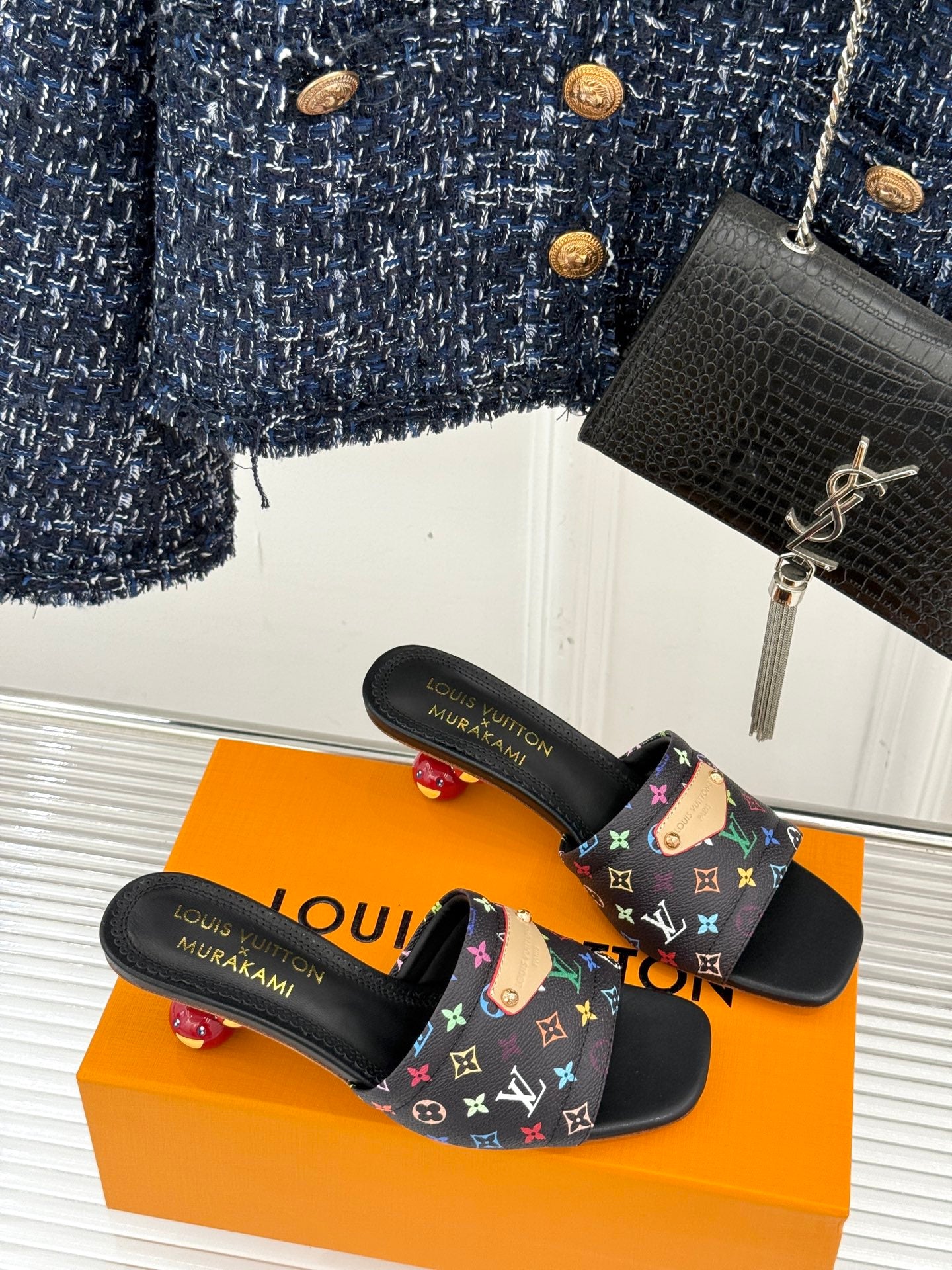 Black slide sandals with multicolor monogram-pattern straps, open-toe