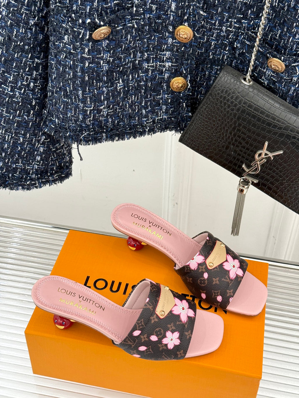 Louis Vuitton slide sandals with floral black straps and pink footbed