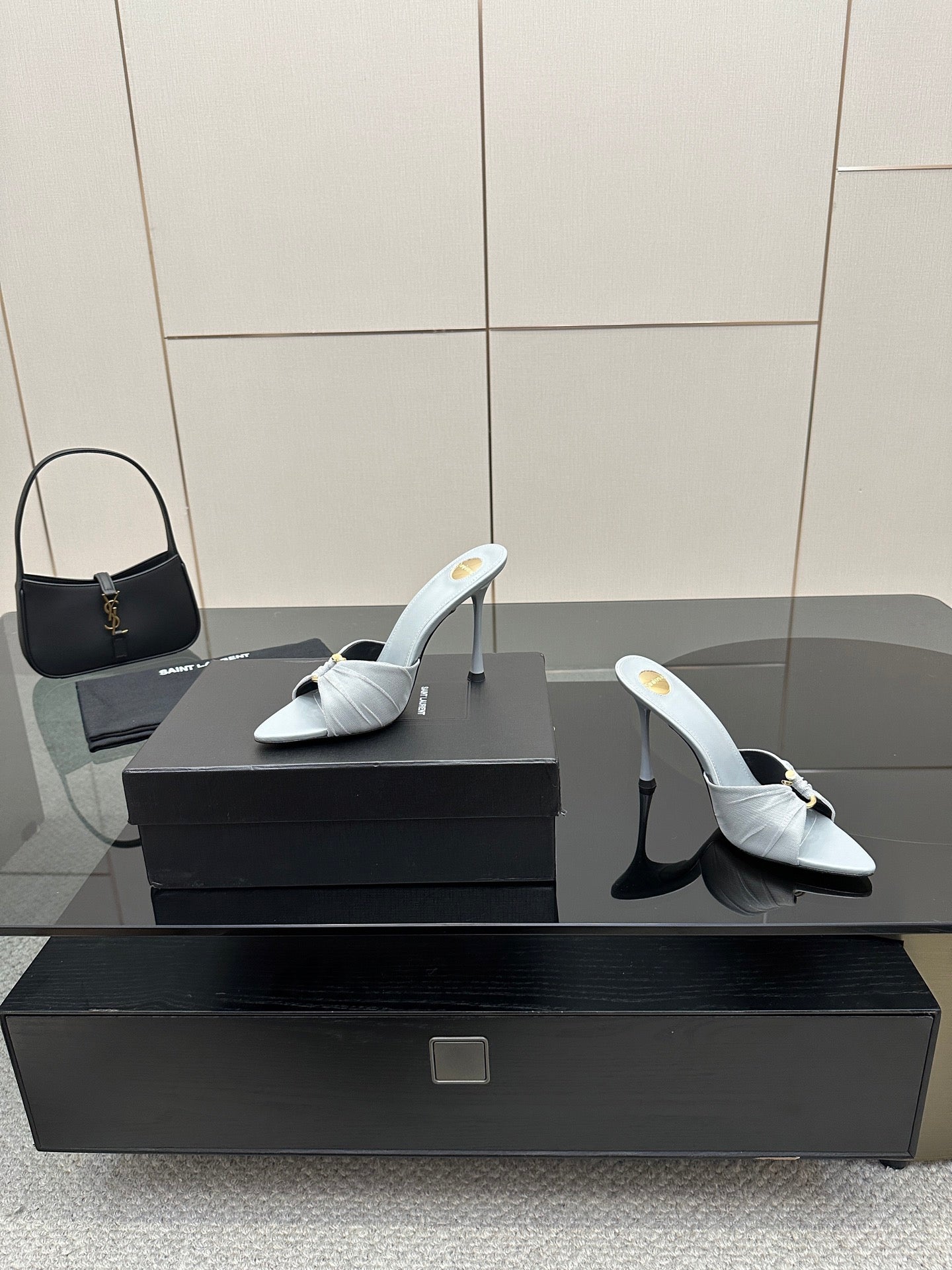Women’s YSL light blue mule sandals, pair with pointed toe and stiletto heels on box