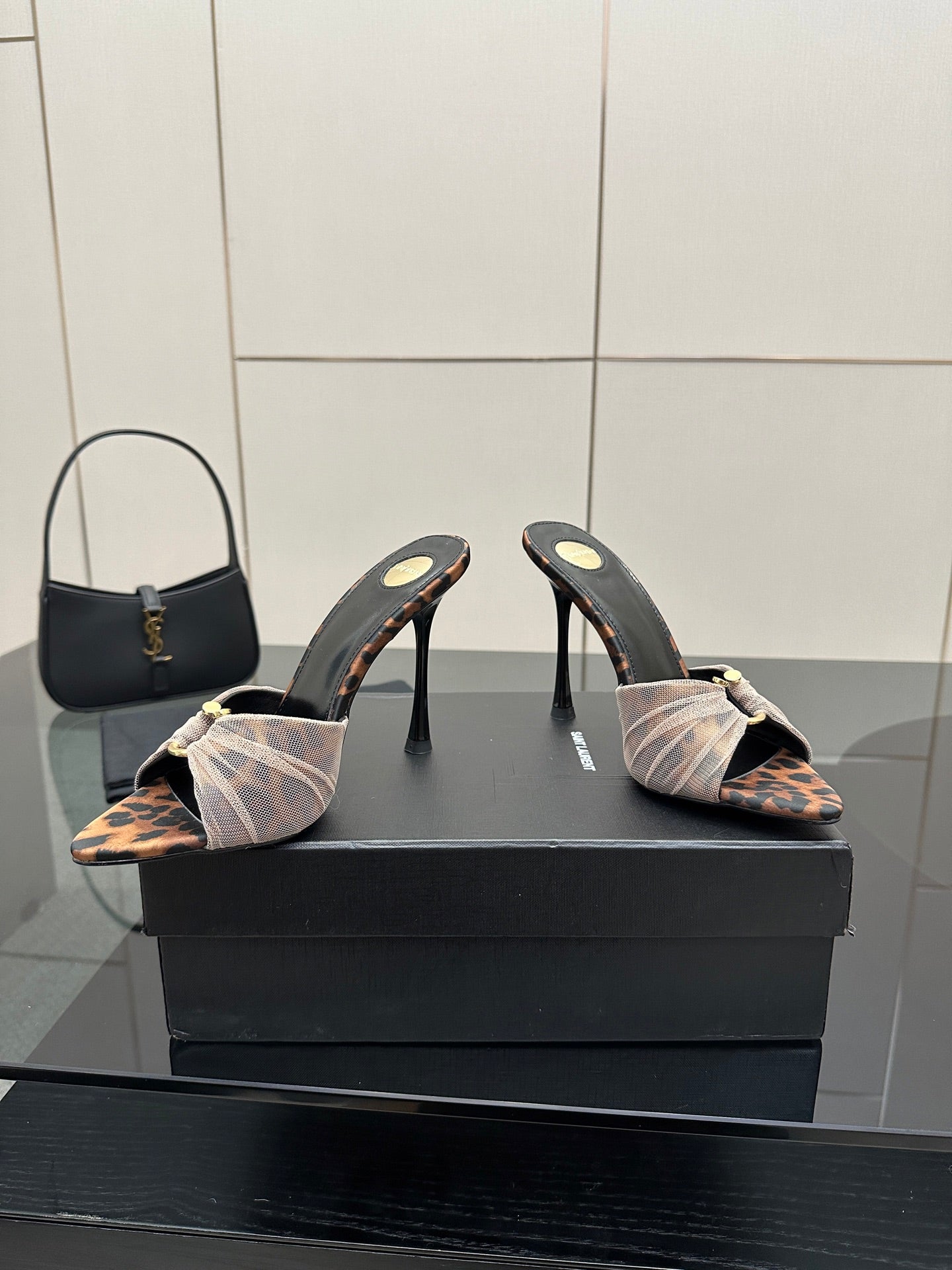 YSL ladies heeled sandal mules on black heels, leopard print inset and bow strap