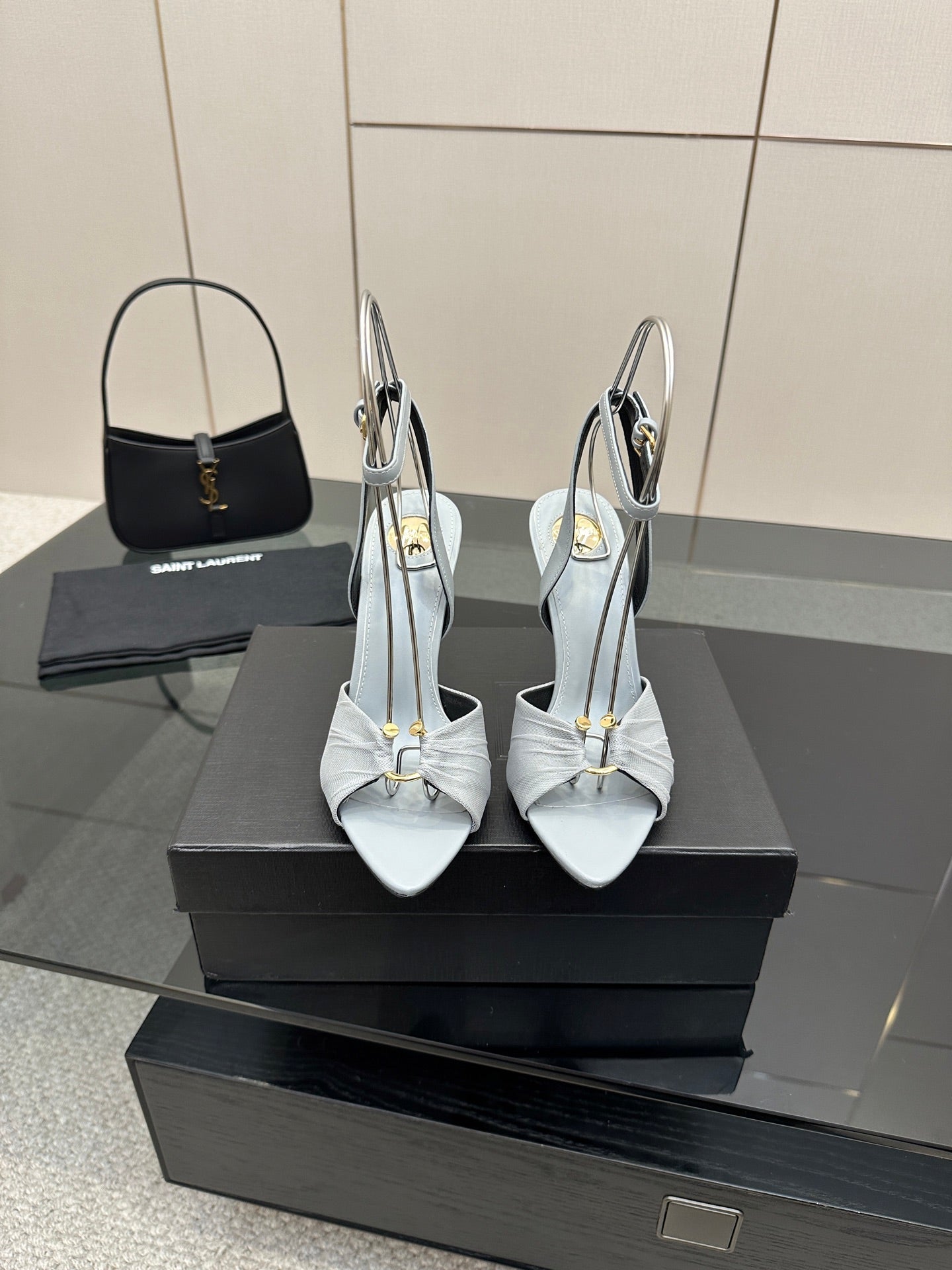 Women’s light-blue peep-toe heeled sandals with ankle strap and stiletto heel