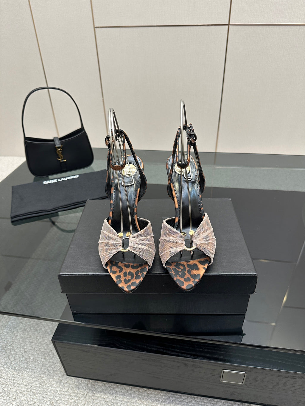 YSL ladies peep-toe stiletto sandals with leopard-print straps and bow ankle detail