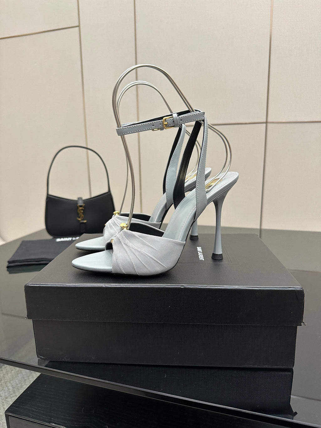 Women’s light-blue slingback heeled sandals with ankle strap and thin stiletto heel