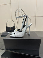 Women’s light-blue slingback heeled sandals with ankle strap and thin stiletto heel
