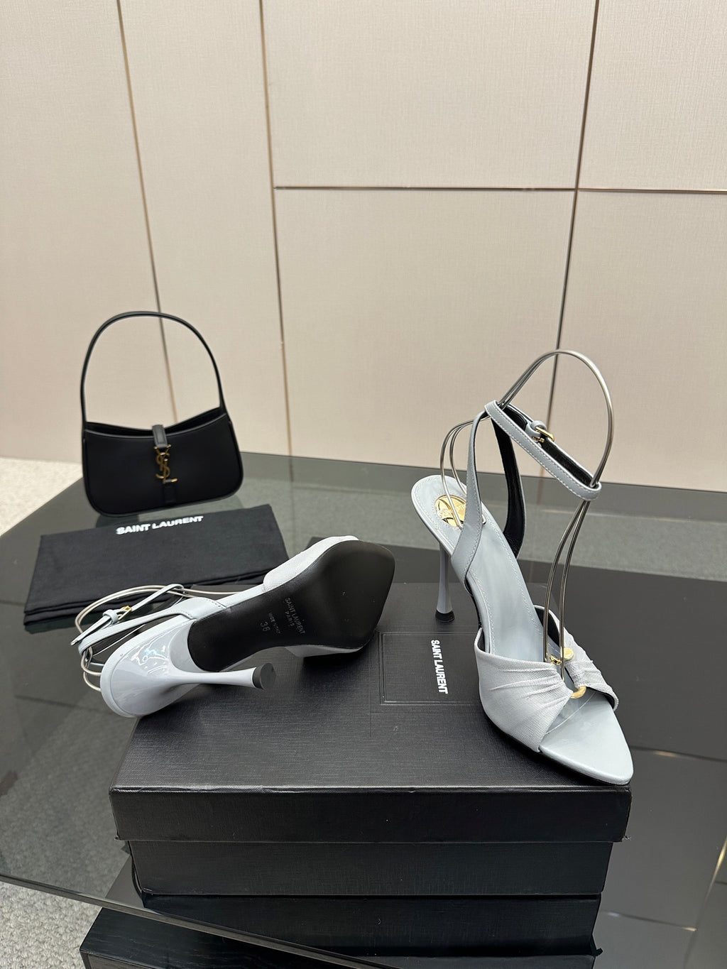 Women’s light-blue peep-toe heeled sandals with ankle strap and stiletto heel