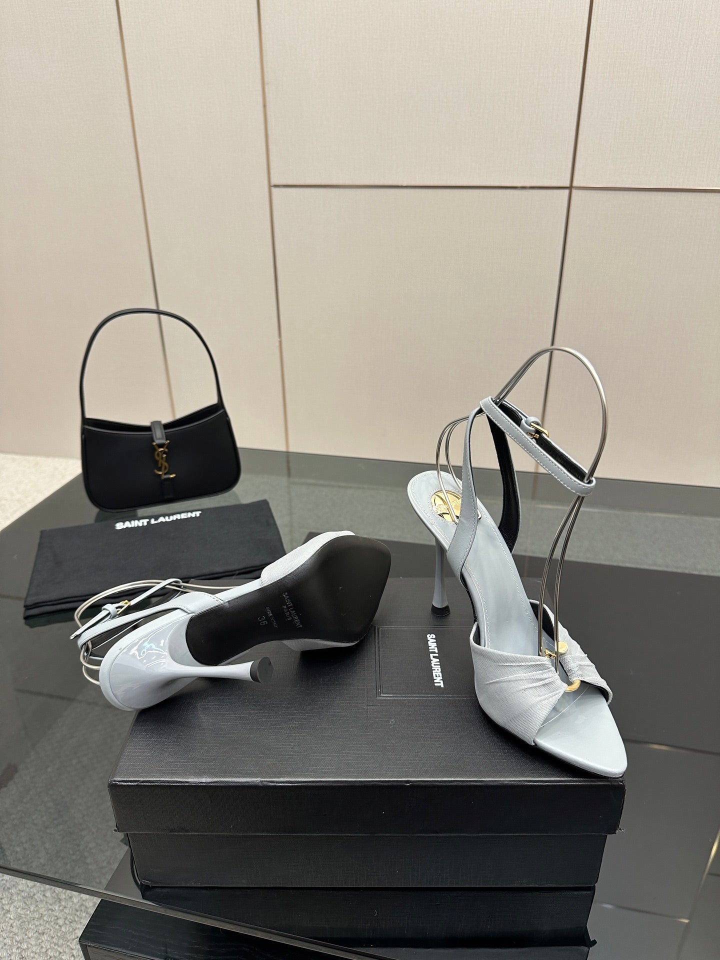 Women’s light-blue peep-toe heeled sandals with ankle strap and stiletto heel