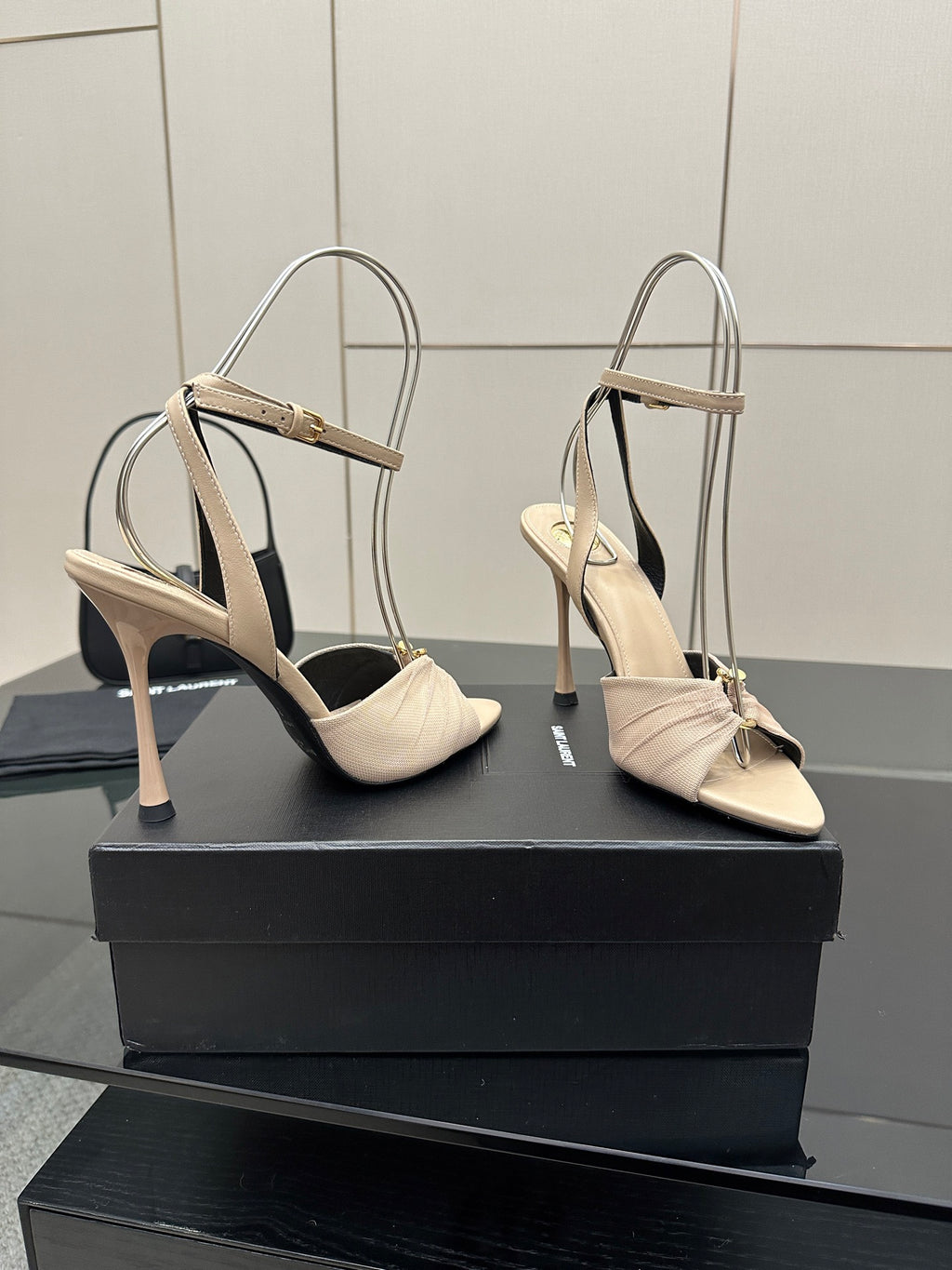 YSL ladies beige strappy heeled sandals with slingback straps, angled view