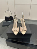 YSL ladies beige strappy heeled sandals with bow detail and pointed toe