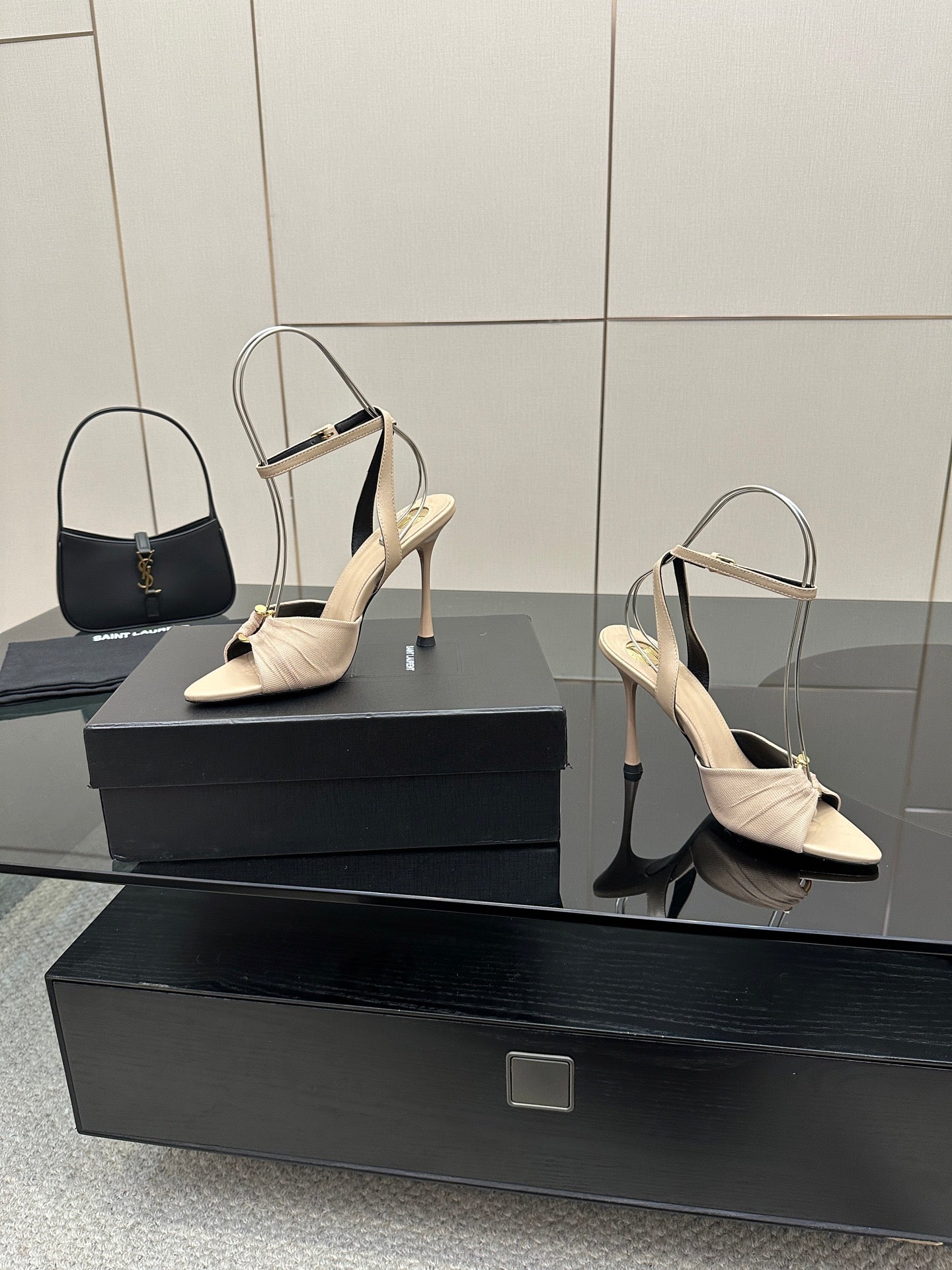 YSL ladies beige strappy heeled sandals with slingback straps, pair on display