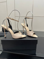 YSL ladies beige strappy heeled sandals with slingback straps, angled front view