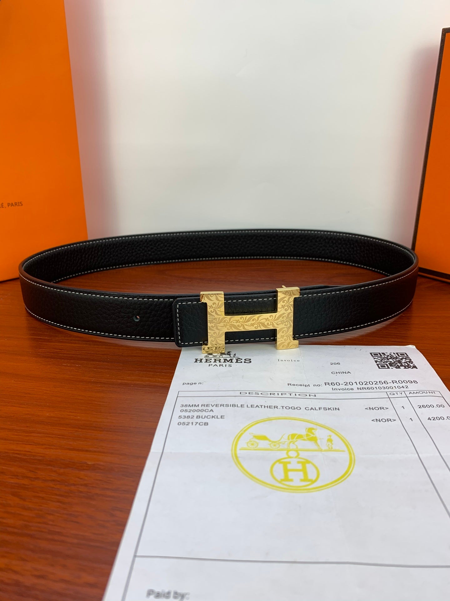 Hermes belt with black strap and gold H buckle