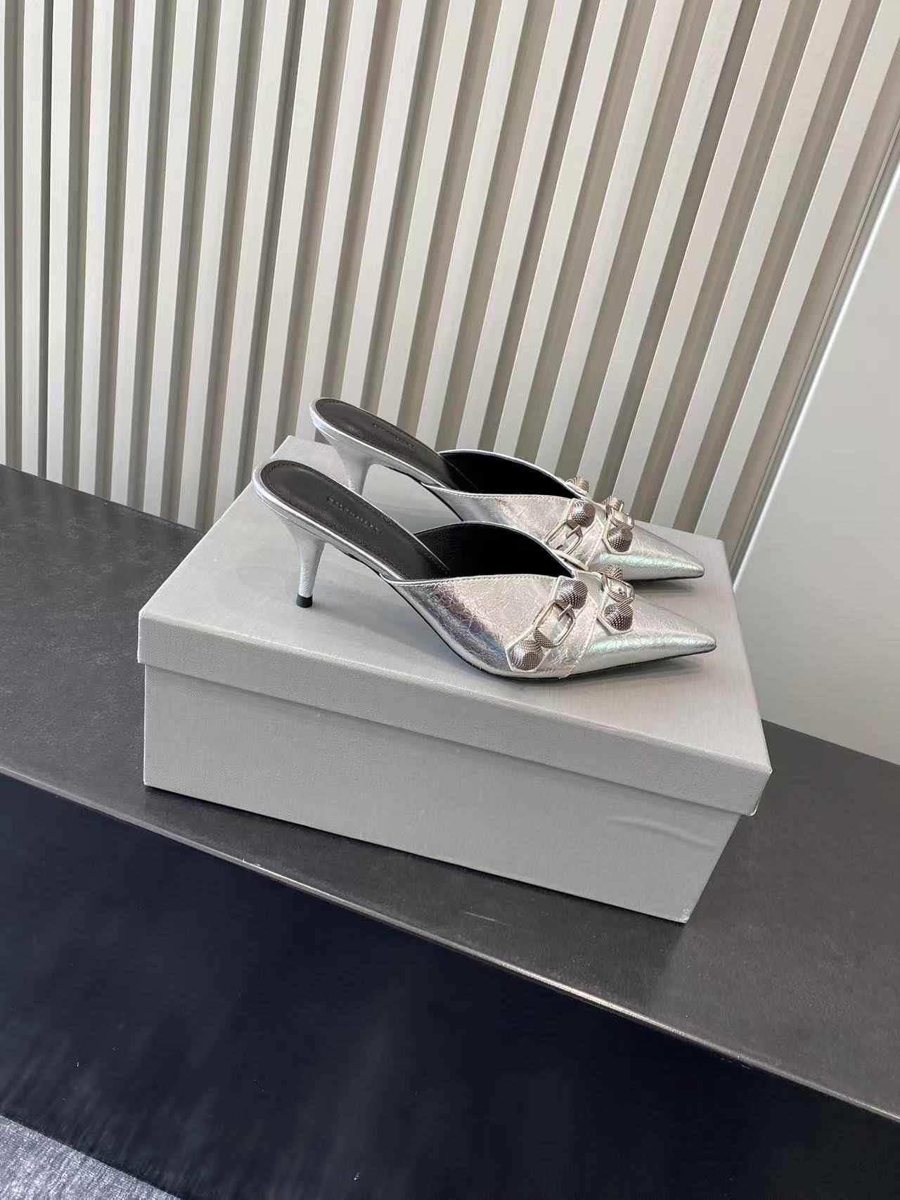 Balenciaga metallic silver heeled sandals, pointed toe with bow-style buckles