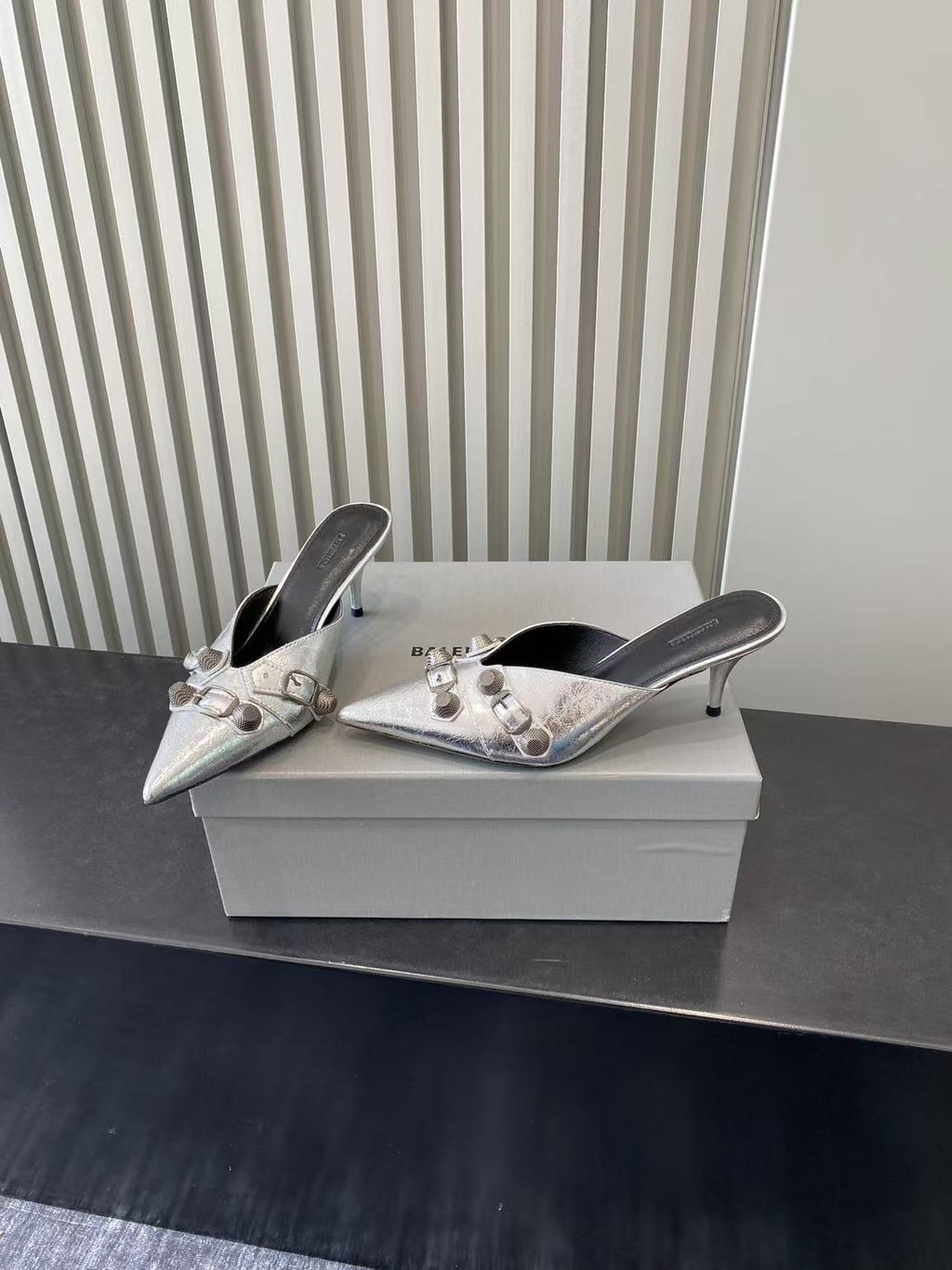 Metallic silver heeled mules, pointed toe with buckle hardware and straps