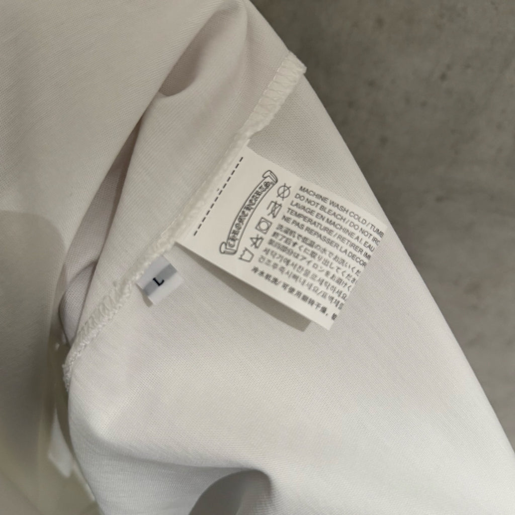 White T-shirt close-up of inside neck label and care tag