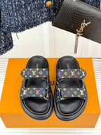 Louis Vuitton black slide sandals with multicolor monogram print, top view