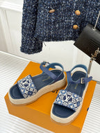 Blue open-toe espadrille sandals with monogram canvas strap and ankle buckle