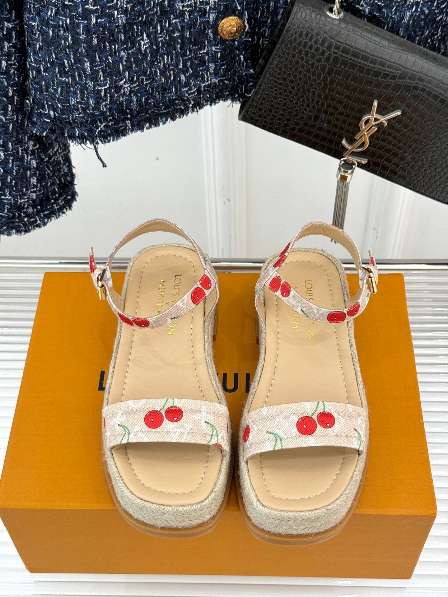 Espadrille wedge sandals with cherry print straps and ankle strap buckle detail