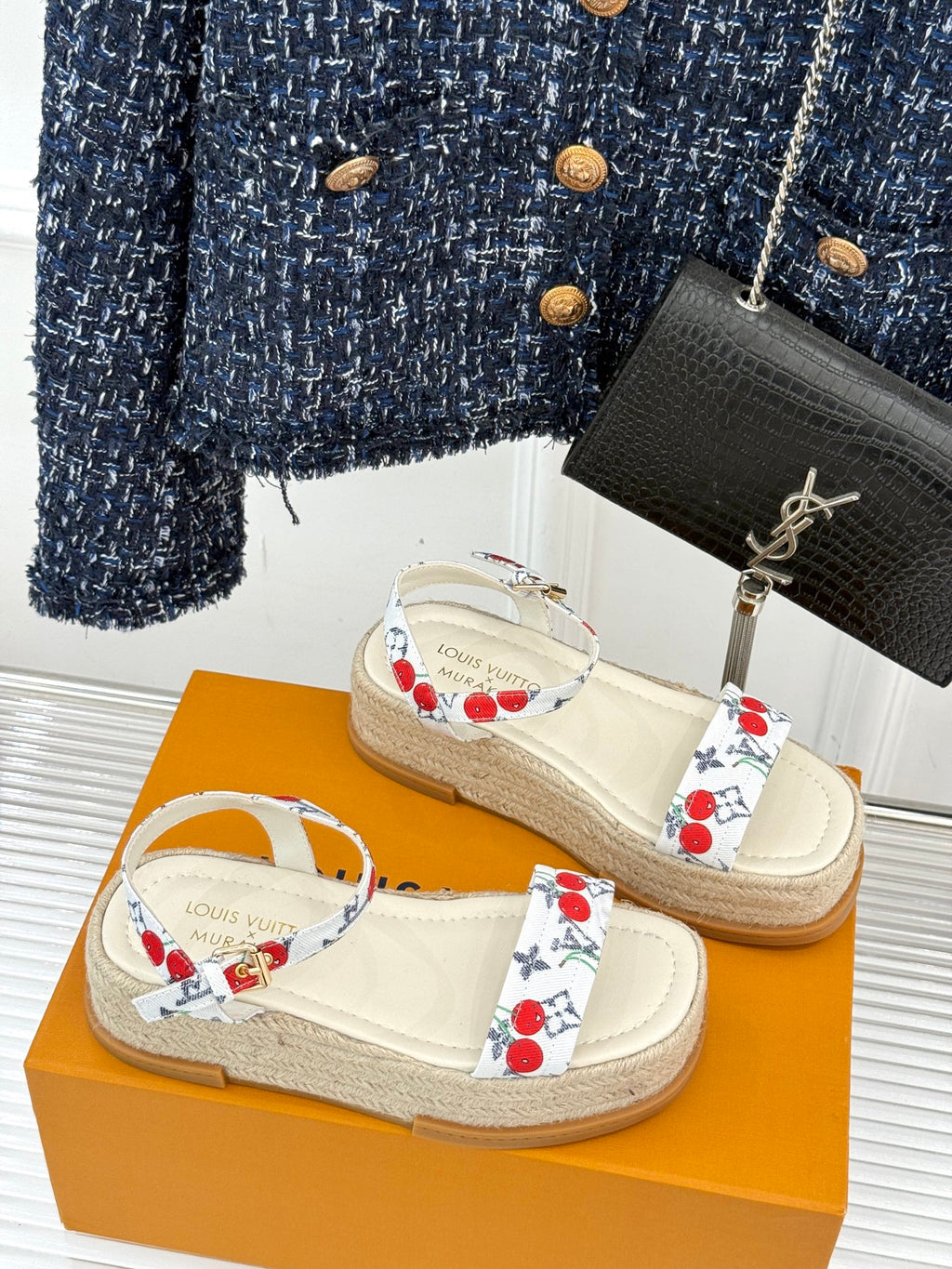 Espadrille sandals with white cherry-pattern straps and braided jute platform sole.